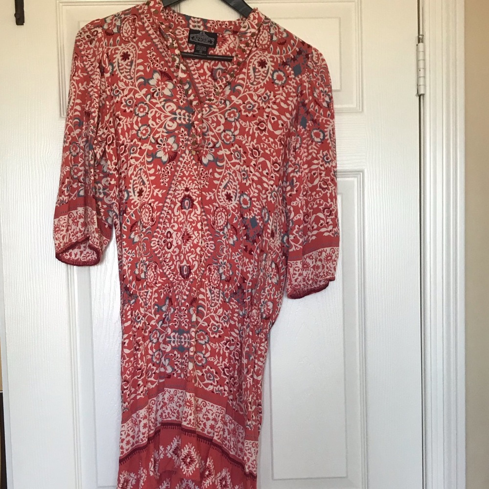 Flowy red dress that falls just above the knee